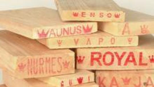 The names printed on the ends of these planks identify the origin of the timber