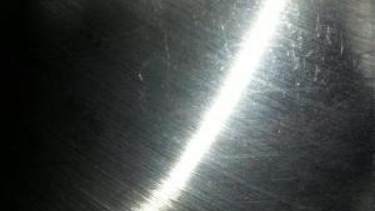 These milling marks on the backs of the chisels were removed with wet & dry over a flat surface