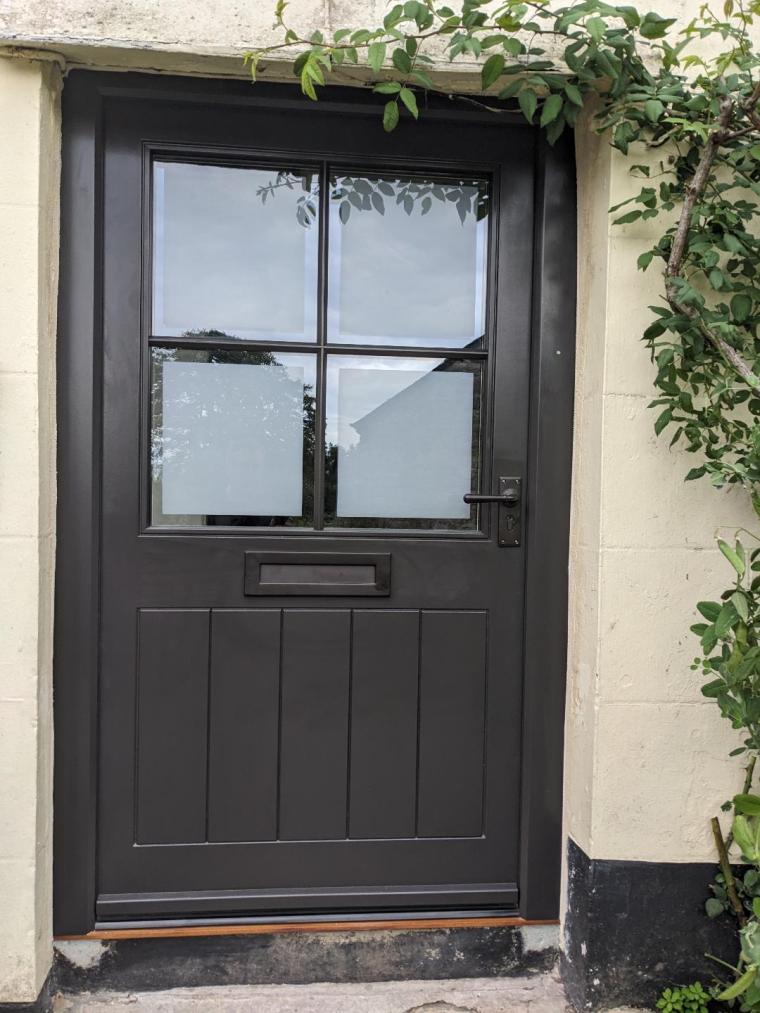 Black front doors made from wood