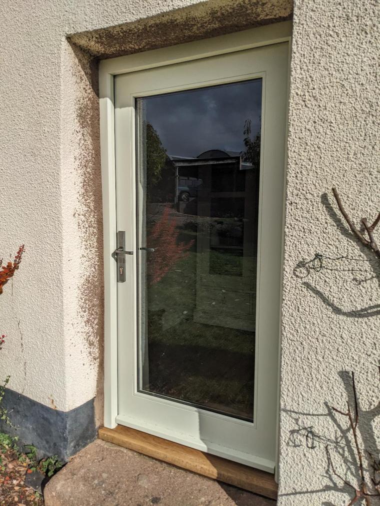Bespoke painted hardwood glazed front door installed in a listed farmhouse near Tiverton.