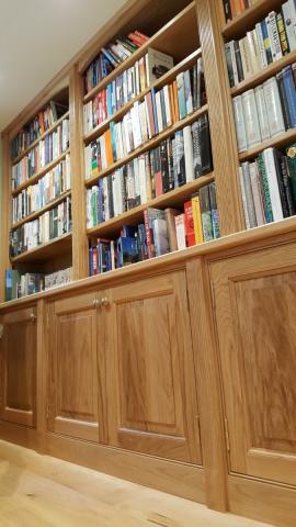 Fitted Oak Bookcase as part of a library