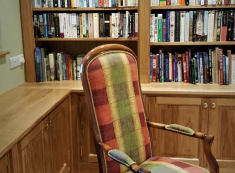Custom fitted Oak wood library with seats 