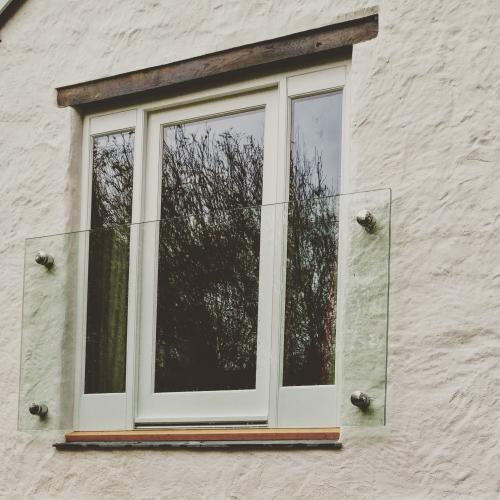 Juliet balcony door made from Oak 