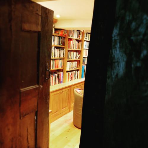 Through the doorway into a bespoke Oak library